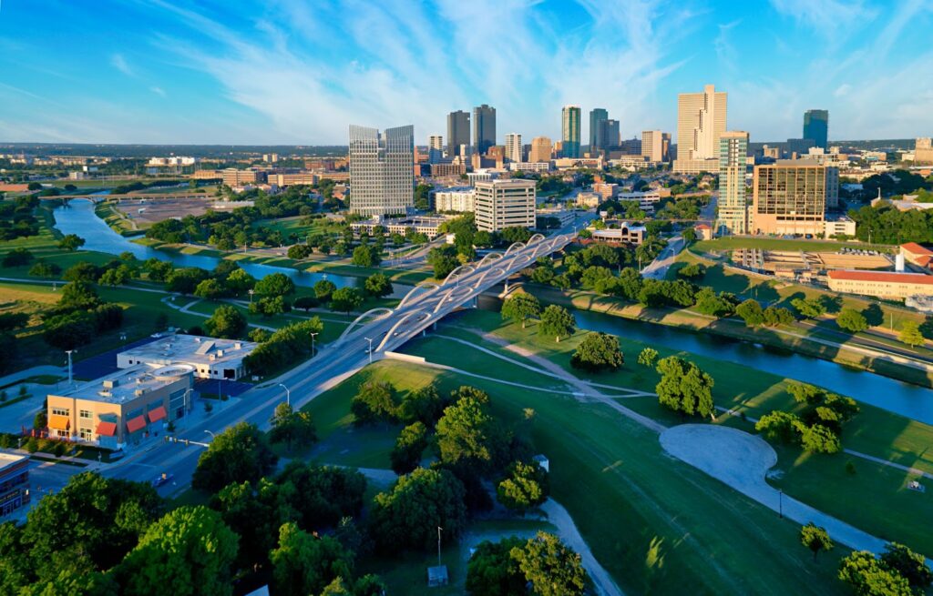 An aerial view of downtown Fort Worth, TX, on a sunny day.